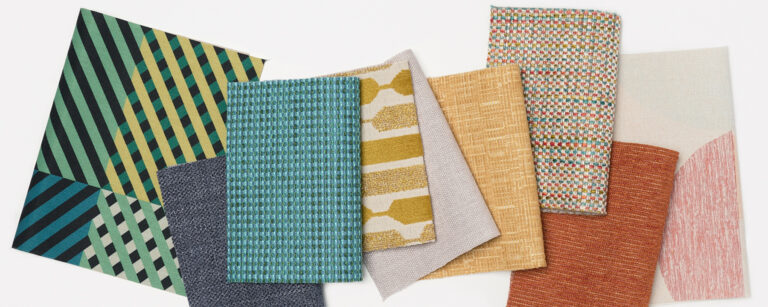 Various multicolored textile swatches in a flatlay